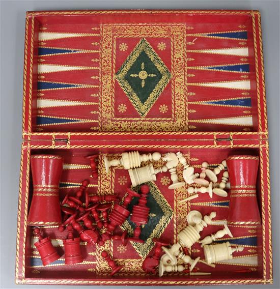 A leather folding chess and draught set and ivory pieces length 38cm